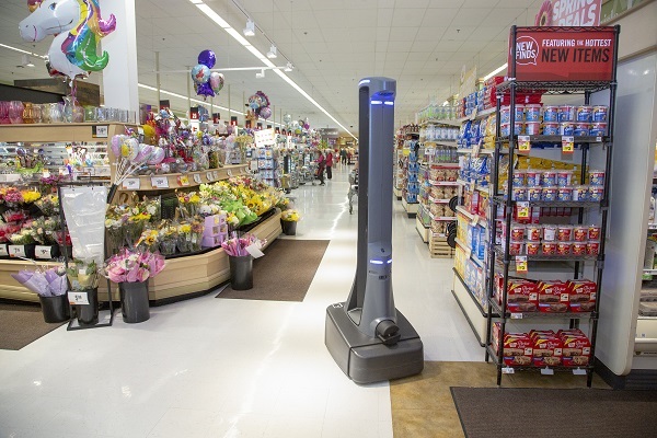 Marty the supermarket robot is among the first to travel with customers in the store, looking to avoid collisions and find spills.