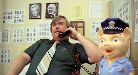 John Candy as Burton Mercer