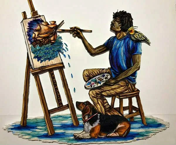 paper quilled portrait of young male artist seated in front of canvas on which he is painting a ship; dog on floor beside him is looking at easel