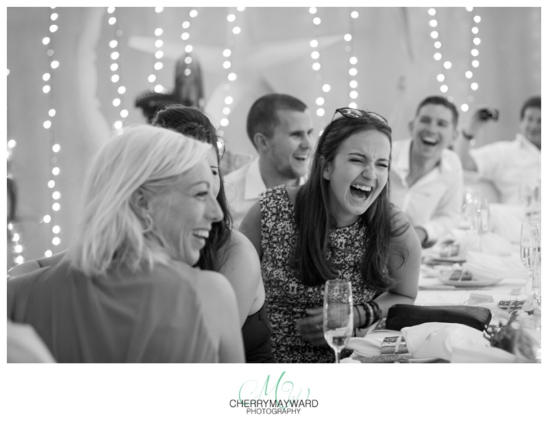 Guests laughing during speeches, Great laughing photo, in the moment, love, laugh, laughing, wedding guests, friends, Beach Republic Wedding, Koh Samui Wedding 