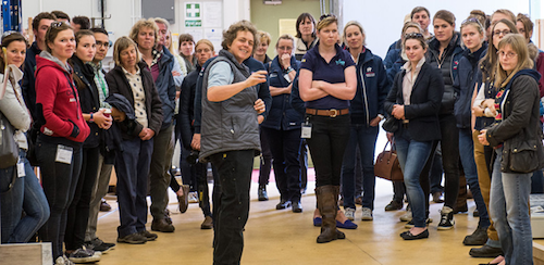 Renate Weller explains research to visitors