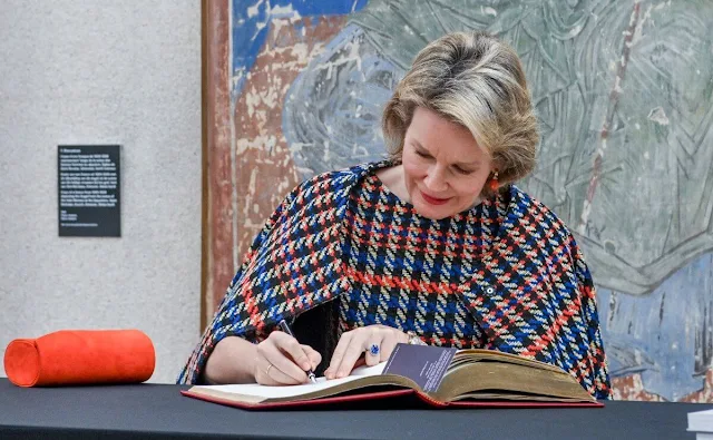 Natan Fall Winter 2017 collection. Queen Mathilde  wore a multicolor check outfit by Natan. Red pumps and orange clutch