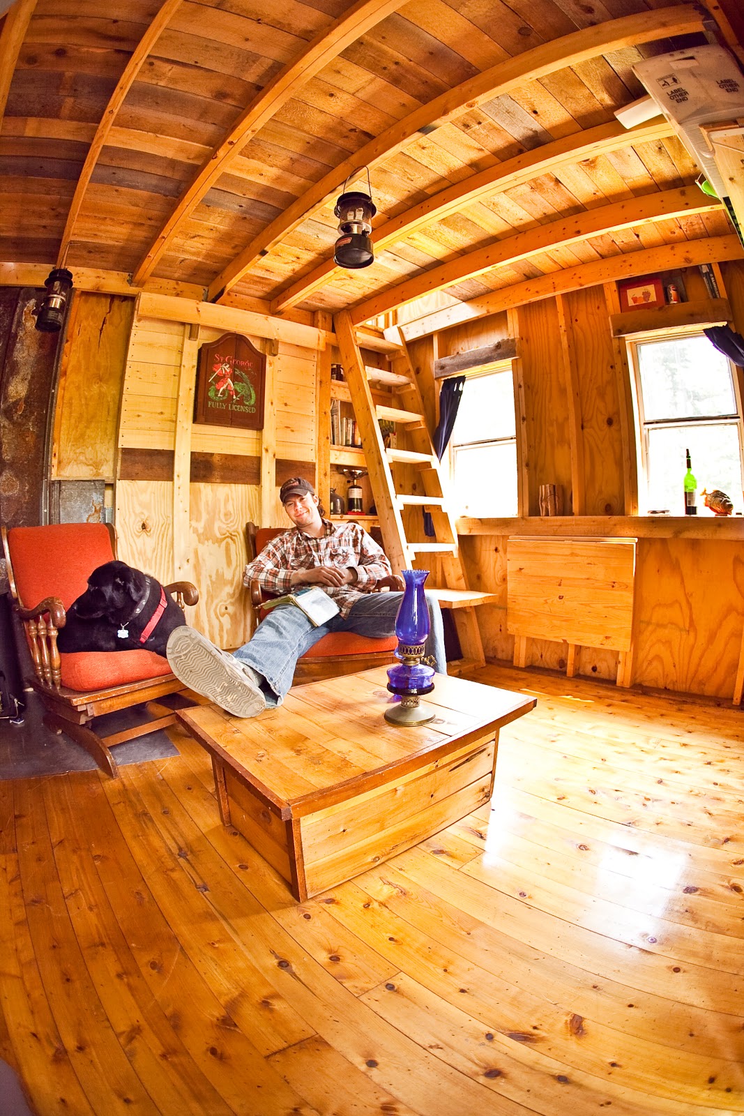 Deek in his off-grid Vermont cabin, which he started building at Age  title=