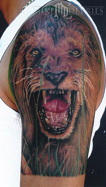 lions tattoos. A lion tattoo design can come
