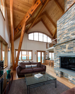 Vermont Timber Works crafted a timber frame designed by Architect Jeremy Bonin for this farmhouse in Vermont.