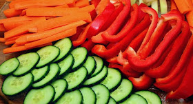 sliced red peppers, cucumbers, and carrots