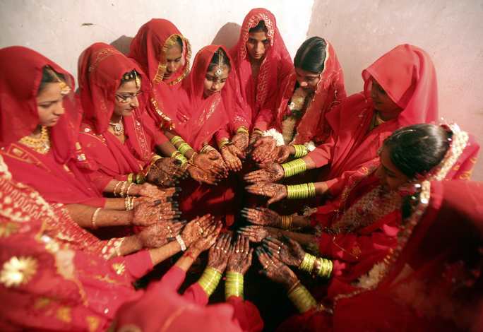 A total of 12 Muslim couples from the city took wedding vows on Sunday 