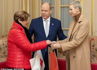 Prince Albert II and Princess Charlene of Monaco Christmas gift distribution