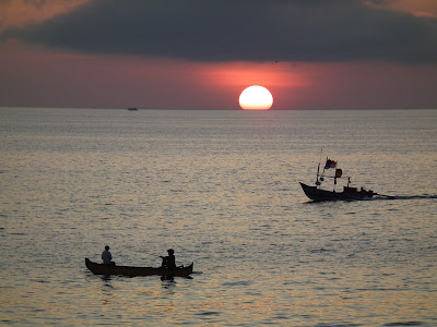 Sunset at Jimbaran Beach, seafood in Jimbaran, romantic dinner in bali