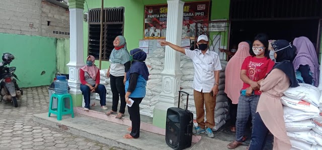 Kampung Tanjung Ratu Ilir Menyalurkan Bantuan Beras  KPM/PKH