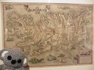 Old map of Iceland with mythical beasts