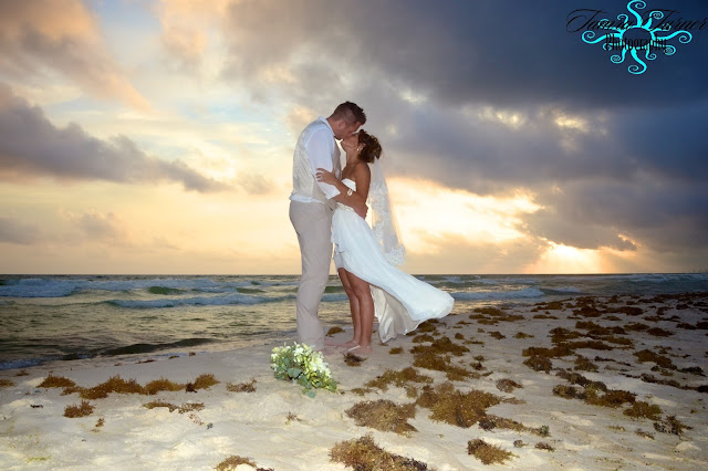 beach wedding photo at sunset over St. Andrew's State Park