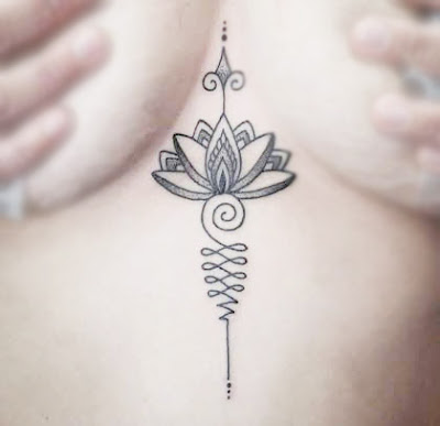 religious breast woman tattoos