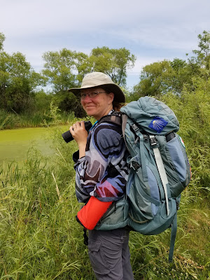 Sonya Richmond birdwatching alongside Thundering Bison Trail.