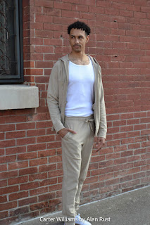 Carter wearing a Ponte jogger set over a white ribbed tank