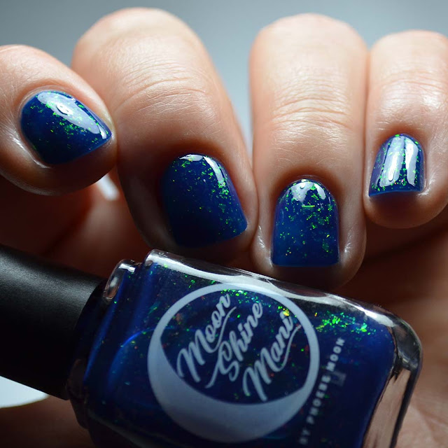 blue crelly nail polish with chameleon flakies