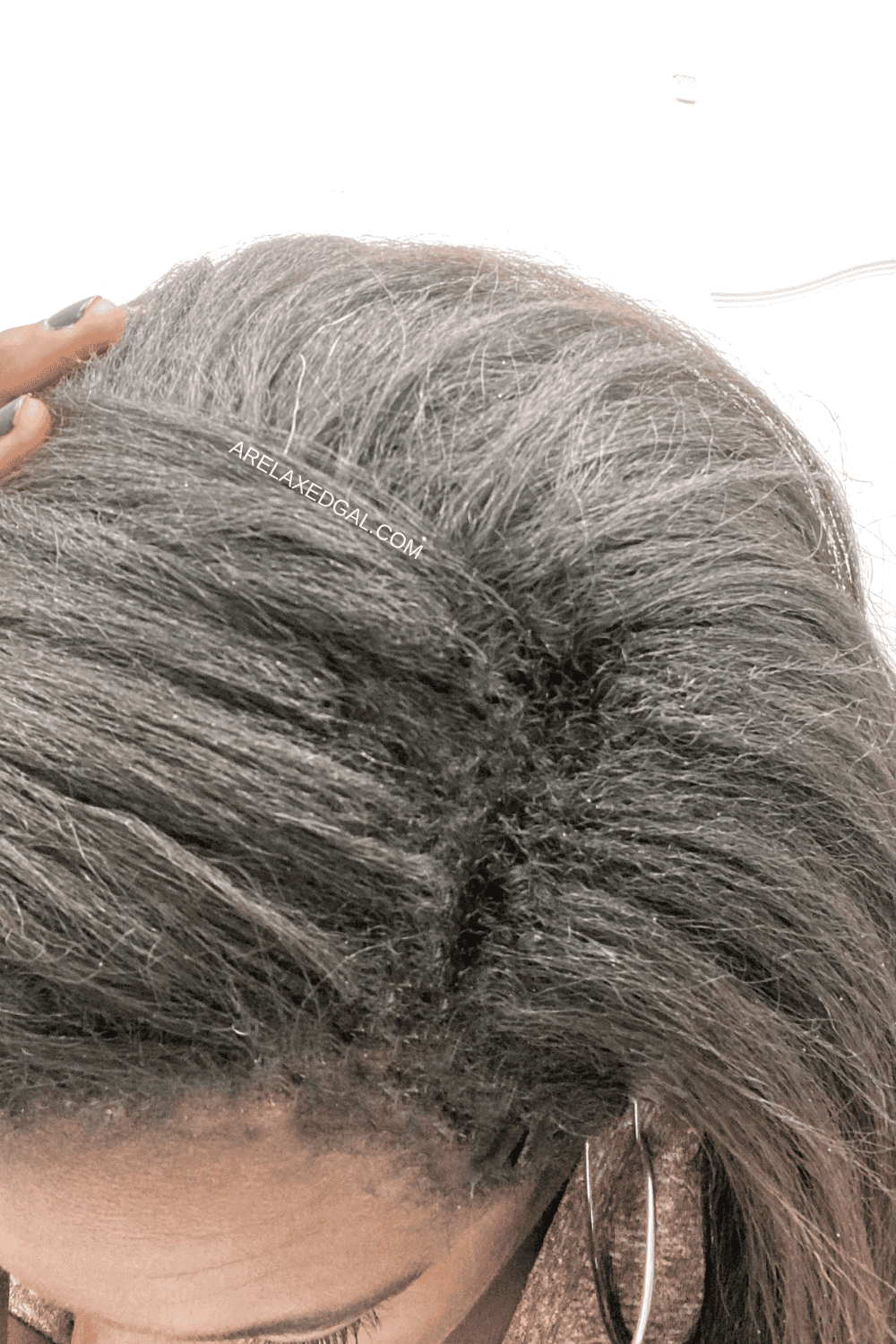 Woman with 10+ weeks of new growth during a relaxer stretch.