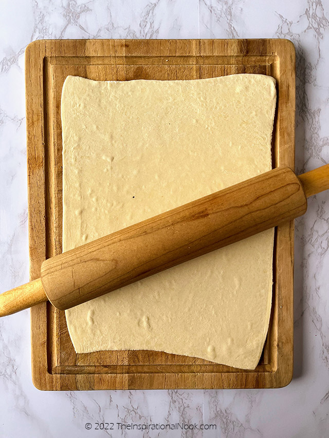 Rolling puff pastry with a rolling pin