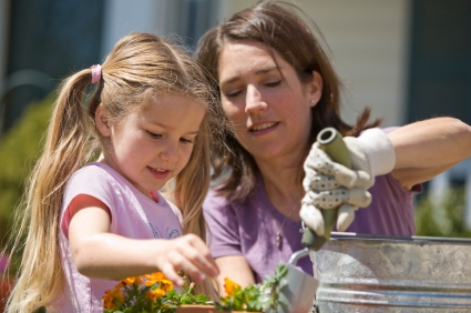 NAMC preparing for new year in a Montessori school as an owner teacher and girl gardening