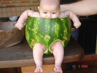 cute baby inside water melon skin