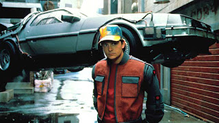 Marty McFly in front of a flying DeLorean.