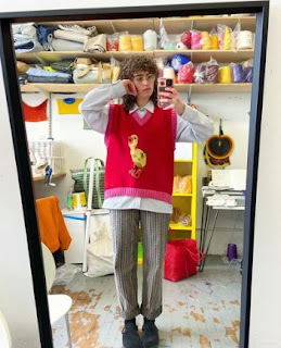 Ella Emhoff clicking mirror selfie