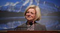 Alberta Premier Rachel Notley speaks to reporters in Calgary on May 27, 2015. (Credit: Jeff McIntosh/The Canadian Press)  Click to Enlarge.