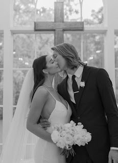Marissa Mowry with her husband Trevor Lawrence in their wedding dress
