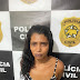 Mulher chora após ser presa pela polícia civil por suspeita de roubo à lotérica em Nova Cruz- RN