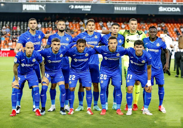 GETAFE C. F. Temporada 2021-22. Mitrovic, Cabaco, Enes Ünal, Olivera, David Soria, Djené. Sandro, Arambarri, Damián Suárez, Maksimovic, Aleñá. VALENCIA C. F. 1 GETAFE C. F. 0. 13/08/2021. Campeonato de Liga de 1ª División, jornada 1. Valencia, estadio de Mestalla. GOLES: 1-0: 10’, Carlos Soler, de penalti.