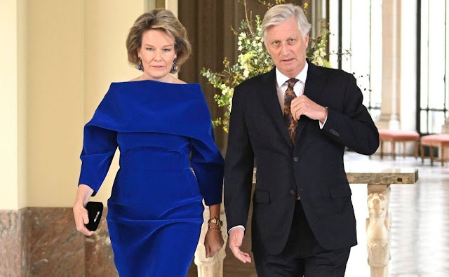 Queen Mathilde wore a royal blue velvet flexible scuba dress by Natan for the European institutions meeting