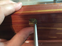 Making the location of the screws with an awl