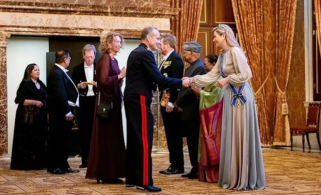 Queen Maxima wore an iridescent multicolor georgette long dress, gown from Luisa Beccaria. Aquamarine tiara set