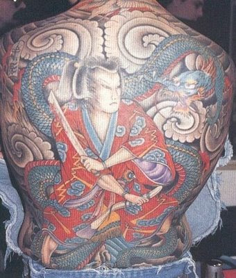 oni mask part of 3 quater oriental sleeve in tattoos by Barry Gannon 