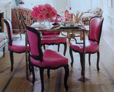 Antique Dining Chairs on Gilt Brass Game Table   Surrounded By Chairs Covered In Pink Leather
