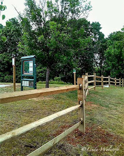 rail fence and sign