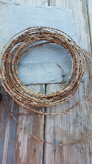 repurposed barn siding wood, barbed wire wreath