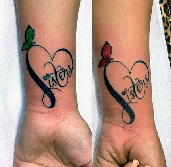 It's really beautiful heart with butterfly matching tattoo designs get with your sister on the wrist