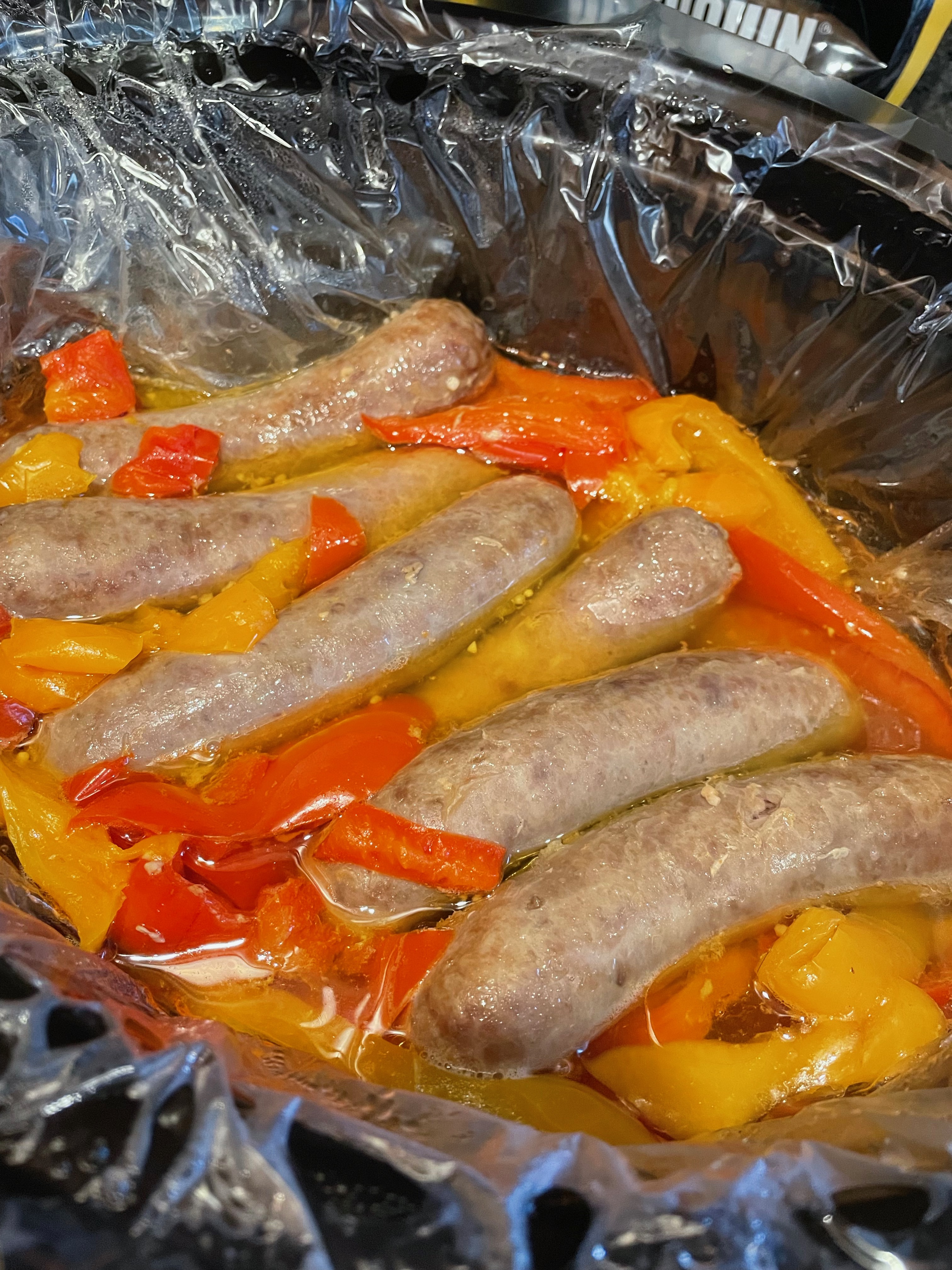 Slow Cooker Brats with Onions and Peppers - Cooking With Carlee