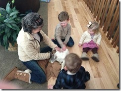 mom, kiddos and baby goat