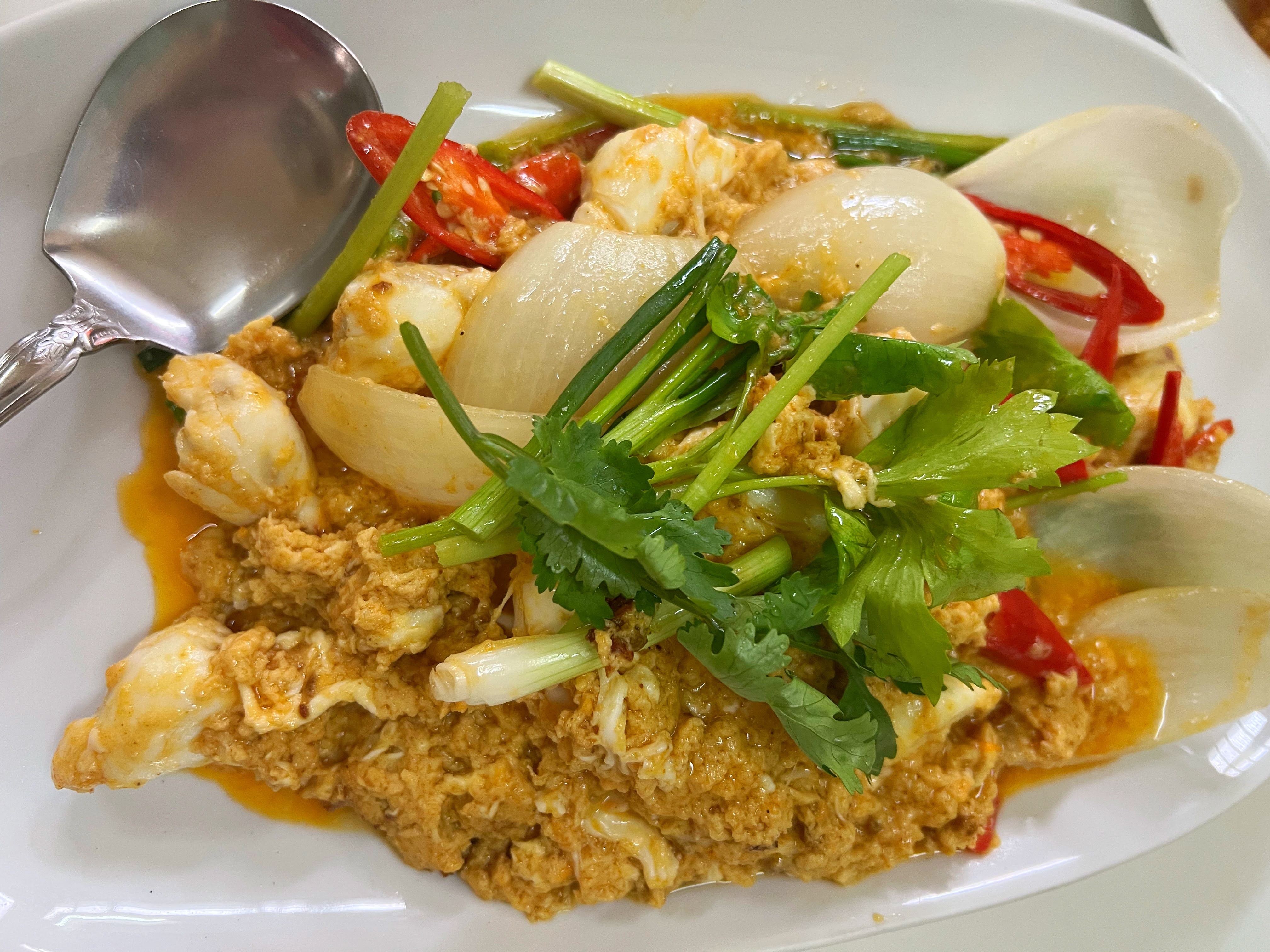 Thai crab yellow curry at Jai Fai's Michelin star Bangkok street food restaurant