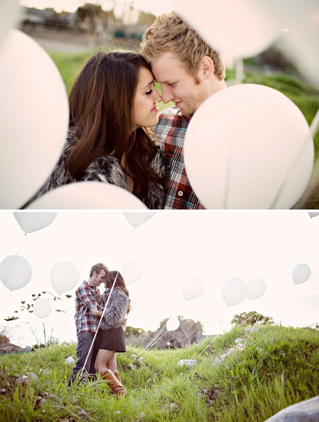 engagement photos with lots of white balloons