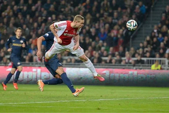 Ajax striker Kolbeinn Sigþórsson heads the ball to score the winning goal against PSV