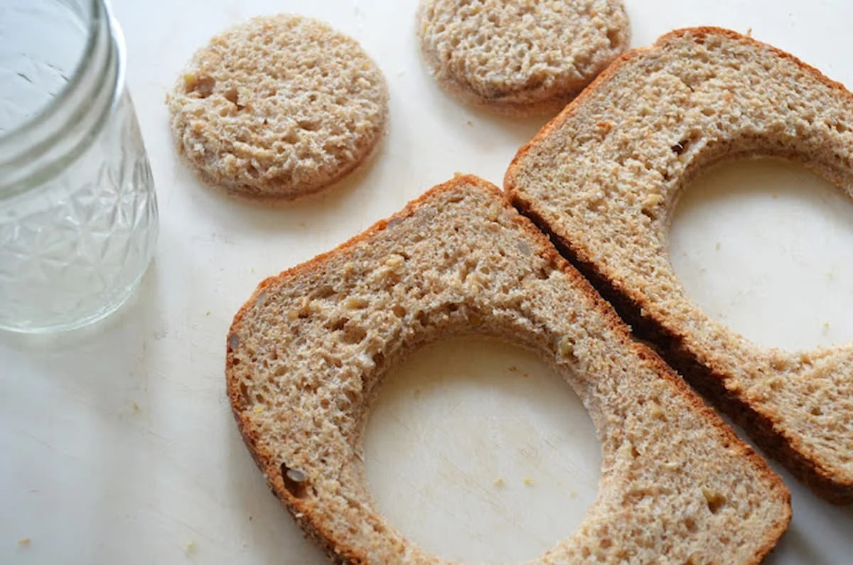 Center rounds of bread removed from bread.