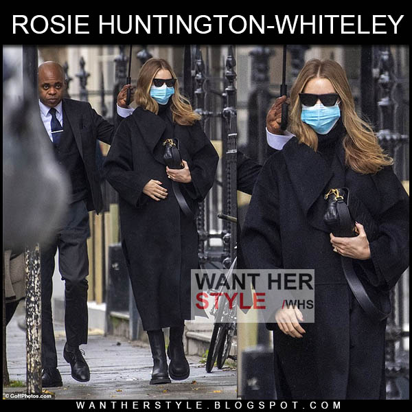 Rosie Huntington-Whiteley in black coat and black combat boot