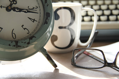 a clock and glasses