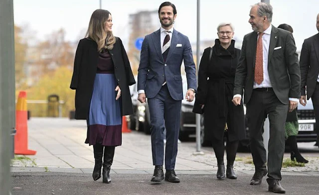 Princess Sofia wore a stretch crepe with colourblock a-line skirt by Hugo Boss, and brown silk satin blouse by Hugo Boss