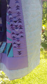 Aqua and purple feather round robin quilt