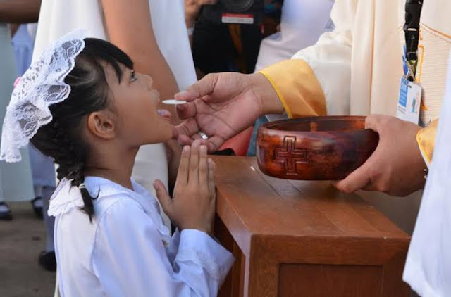 Receiving Communion on the tongue, prayer after communion, saint Thomas Aquinas prayer