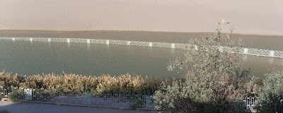 A view of a portion of the Crescent Moon Lake beneath the sand dunes